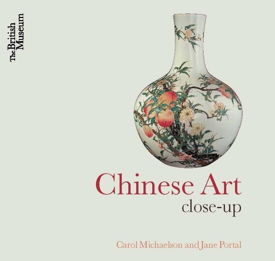 Porcelain vase with painted peaches, blossoms, and birds; book cover.