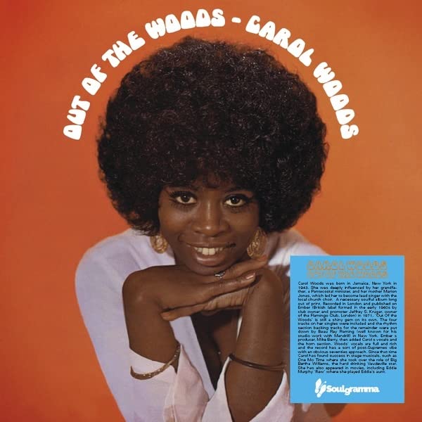 Vinyl record cover featuring portrait of Carol Woods with orange background.