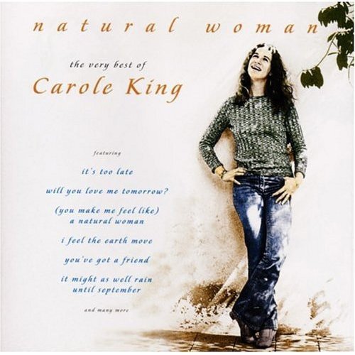 Carole King's album cover featuring a smiling woman standing beside a tree branch.
