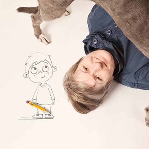 Boy with cartoon drawing and a dog, learning resource image.