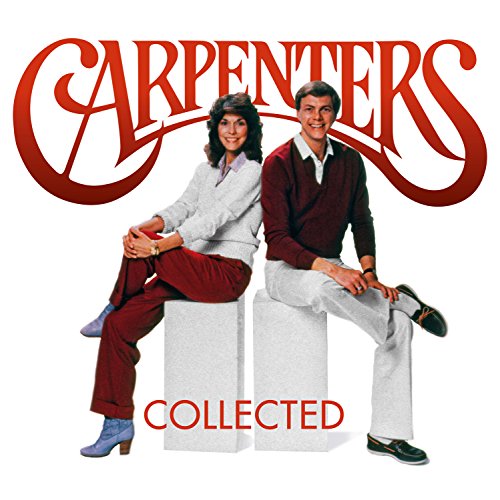 Karen and Richard Carpenter sit on white pedestals against a white background.