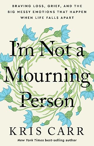 Book cover with floral wreath and bold title, "I'm Not a Mourning Person.