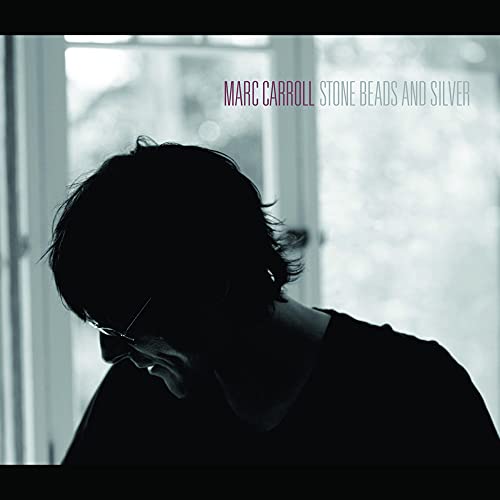 Album cover: Silhouette of a man with glasses, titled "Stone Beads & Silver".