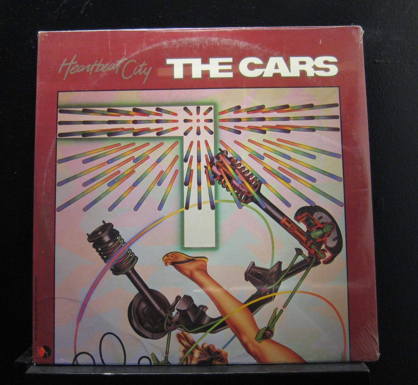 The Cars’ “Heartbeat City” vinyl album cover with abstract car parts.