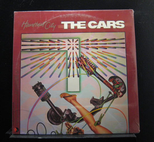 The Cars’ “Heartbeat City” vinyl album cover with abstract car parts.