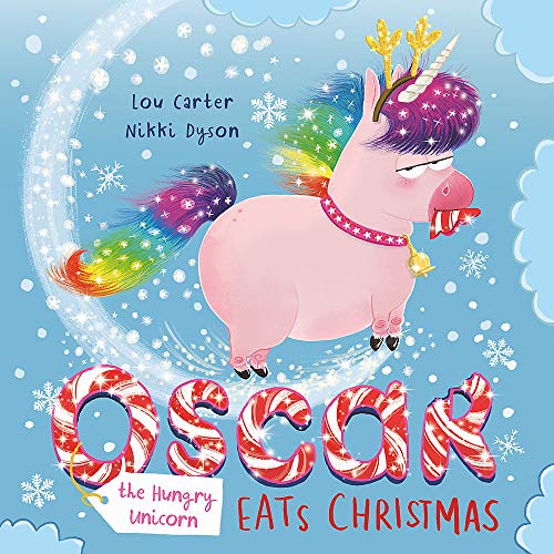 Pink unicorn with rainbow mane and tail, wearing antlers, with candy cane text.