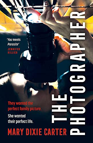 Book cover featuring a camera lens focused on a person's face.