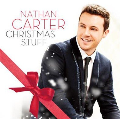 Nathan Carter album cover with a portrait and red ribbon.