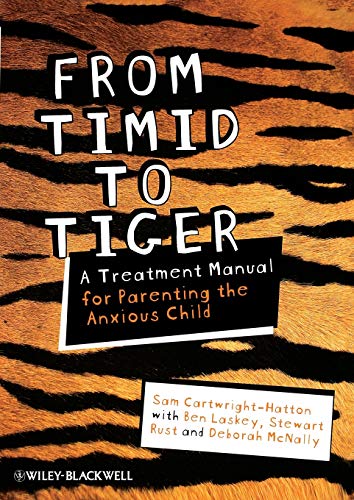 Book cover: "From Timid To Tiger" with a tiger stripe background.