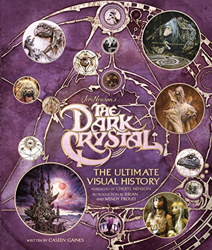 Book cover for The Dark Crystal The Ultimate Visual History with purple background illustrations.