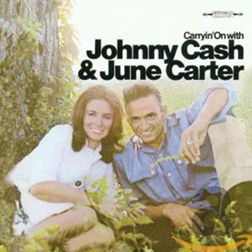 Johnny Cash and June Carter Cash album cover, seated in greenery.