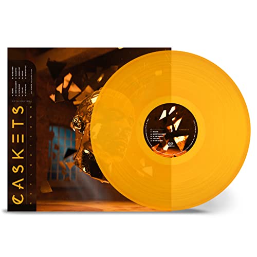 Yellow vinyl record with album cover depicting a fractured face.