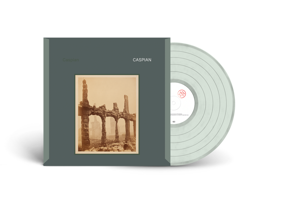Caspian album cover and clear vinyl record with a central label.