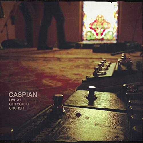 Caspian live album vinyl record with yellow disc and church image.