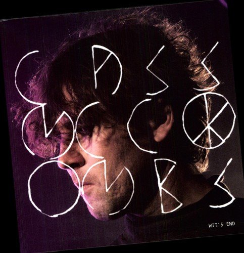 Album cover for Cass McCombs' "Wit's End" featuring a portrait and white text.