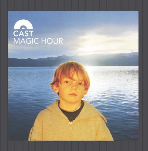 CD cover: boy by water with mountains under a blue sky.