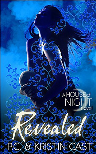Book cover: woman with long dark hair, blue swirls, title "Revealed".