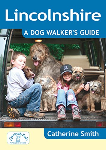 Book cover featuring children and multiple dogs in a car’s open trunk.