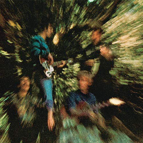 Creedence Clearwater Revival’s “Bayou Country” vinyl album cover, blurred band image.