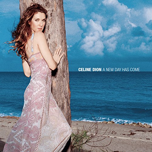 Céline Dion album cover, beach scene, woman in flowing dress.
