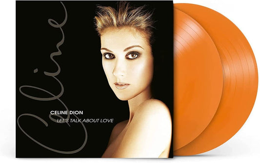 "Orange vinyl records with Céline Dion album cover featuring her portrait."