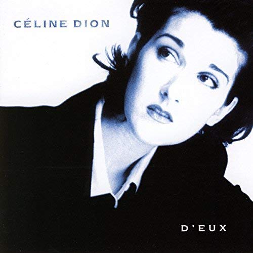Album cover featuring a blue-toned portrait of Céline Dion wearing a dark blazer.
