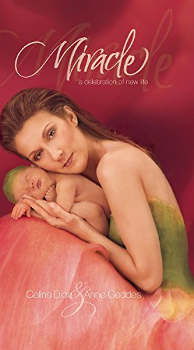 Celine Dion cradling a newborn baby against a red background on the album cover.