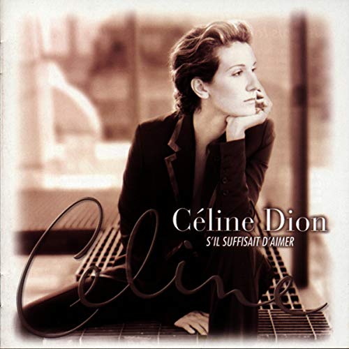 Céline Dion album cover, sepia toned, woman in a suit on a bench.