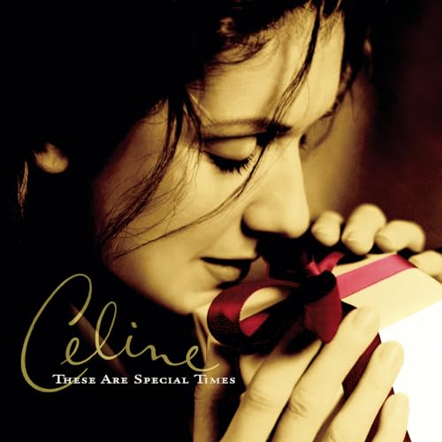 Céline Dion album cover: close-up of a woman holding a gift.