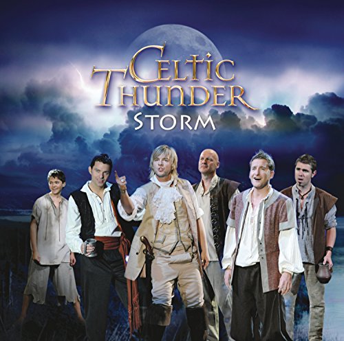 The Celtic Thunder group stands before a stormy sky with a large full moon.