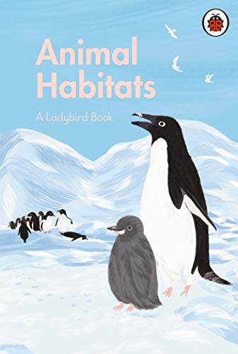 "Book cover featuring illustration of penguins on ice with 'Animal Habitats' title and Ladybird logo."
