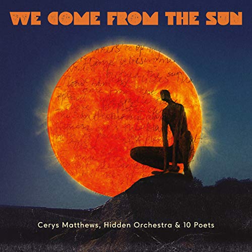 Album cover with a silhouette of a person standing on a hill, facing a large sun.