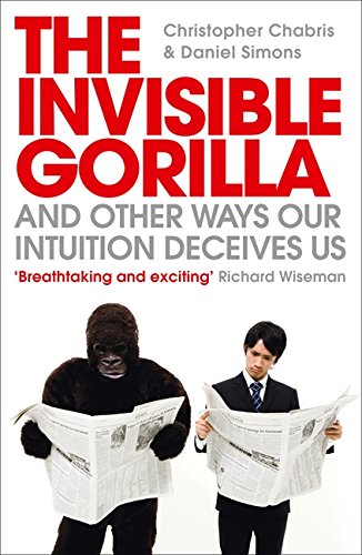 Book cover: gorilla and man reading newspapers, red title text.