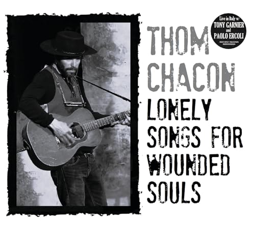 Black and white CD cover featuring a man with a guitar.