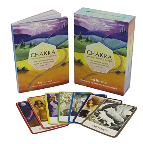 Chakra oracle cards and guidebook set with colorful, illustrated cards.