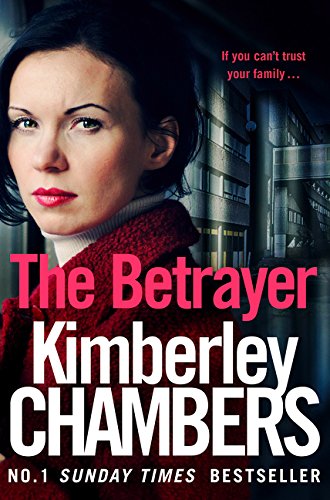 Book cover: woman’s face, red sweater, title “The Betrayer” in pink text.