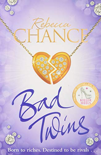 Book cover for “Bad Twins” featuring a broken, jeweled heart necklace.