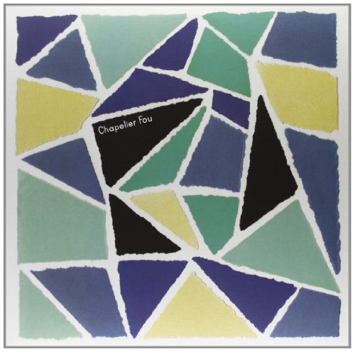 Abstract vinyl record cover with fragmented geometric shapes in blue, green, and yellow.