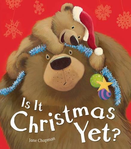 Brown bears hugging, wearing a Santa hat, with festive decorations.