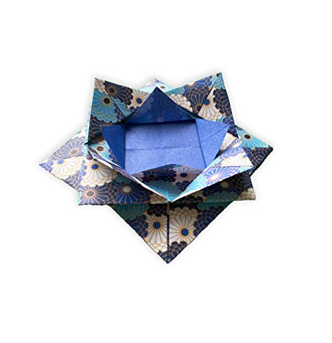 Blue and white floral origami bowl, viewed from above.