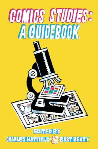 Yellow book cover with microscope illustration and comic panel details.