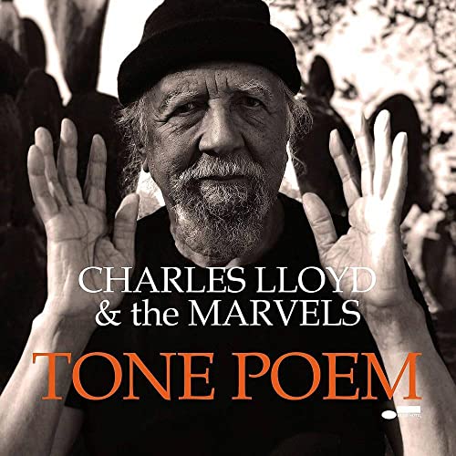 Black and white portrait of Charles Lloyd with album title overlay.