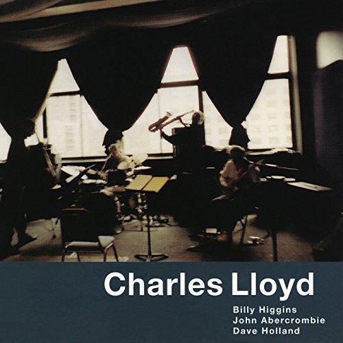 Charles Lloyd album cover: jazz musicians playing in a dimly lit room.