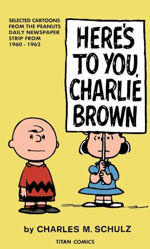 Charlie Brown and Patty holding a sign reading "Here's To You, Charlie Brown".