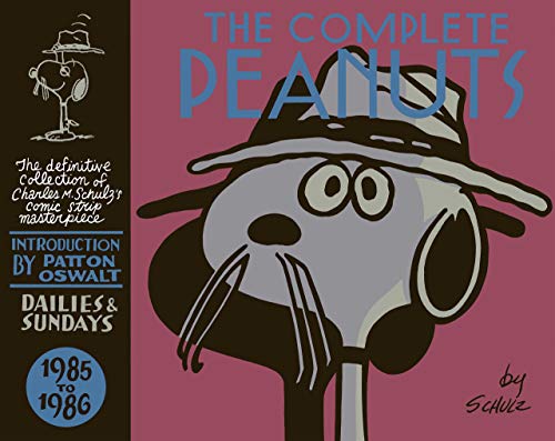 Book cover: "The Complete Peanuts 1985-1986", featuring Snoopy in a hat.