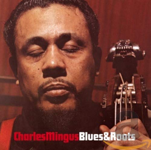 Charles Mingus portrait with bass guitar, album cover "Blues & Roots".