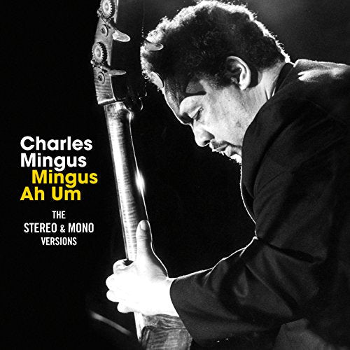 Black and white album cover of Charles Mingus playing the bass.