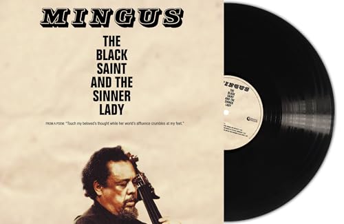 Charles Mingus album cover and vinyl record, featuring a portrait.