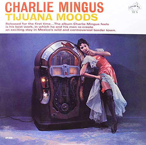 Tijuana Moods" vinyl album cover featuring a woman and jukebox illustration.