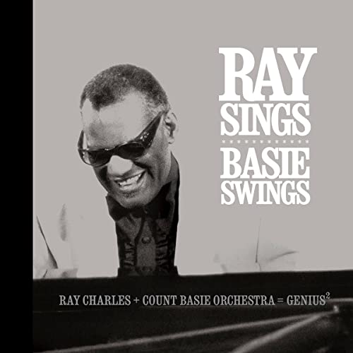 Black and white album cover featuring Ray Charles smiling with sunglasses.